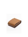 Playing cards leather pochette by Poltrona Frau shown closed highlighting its slim and refined silhouette
