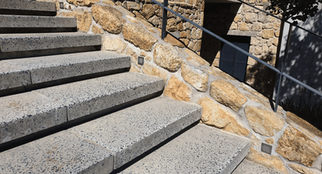 Close-up of precast step coping with consistent chamfer and slip-resistant finish.