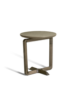Fidelio small table Ø45 shown in full view with a compact round top and cantilevered base, highlighting its clean lines and balanced proportions
