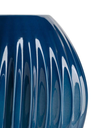 Shiwa vase by Poltrona Frau shown in close detail highlighting the glossy blue finish and vertical ribbed ceramic form.
