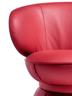 Close-up of the cushioned seat with smooth contours and refined upholstery, highlighting comfort and craftsmanship