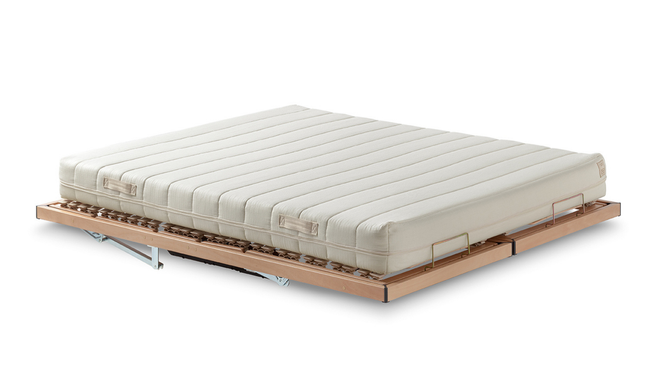 Linosa Topper by Poltrona Frau from the Poltrona Frau bedroom collection displayed on an adjustable bed base highlighting the quilted mattress topper designed for enhanced sleeping comfort