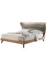 Three-quarter view of the Mamy Blue bed showing the depth of the headboard and the overall proportions