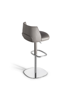 Angled view of the Archibald stool with steel base by Poltrona Frau showing the curved backrest and integrated footrest