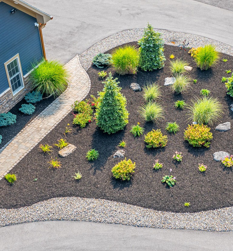 Aerial view of a landscaped garden with all natural mulch from Clifton Recycling located in Clay NY.