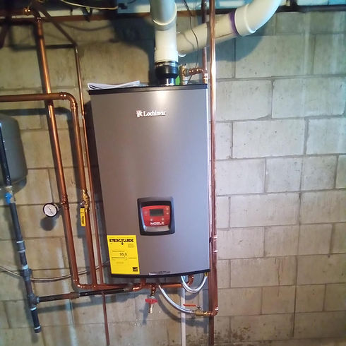 Modern Laars Boiler displayed with piping and yellow energy label in basement.