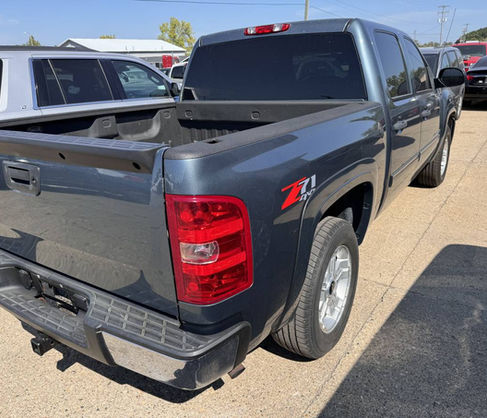 Silverado Z71 truck parked outdoors on a sunny day Inventory available