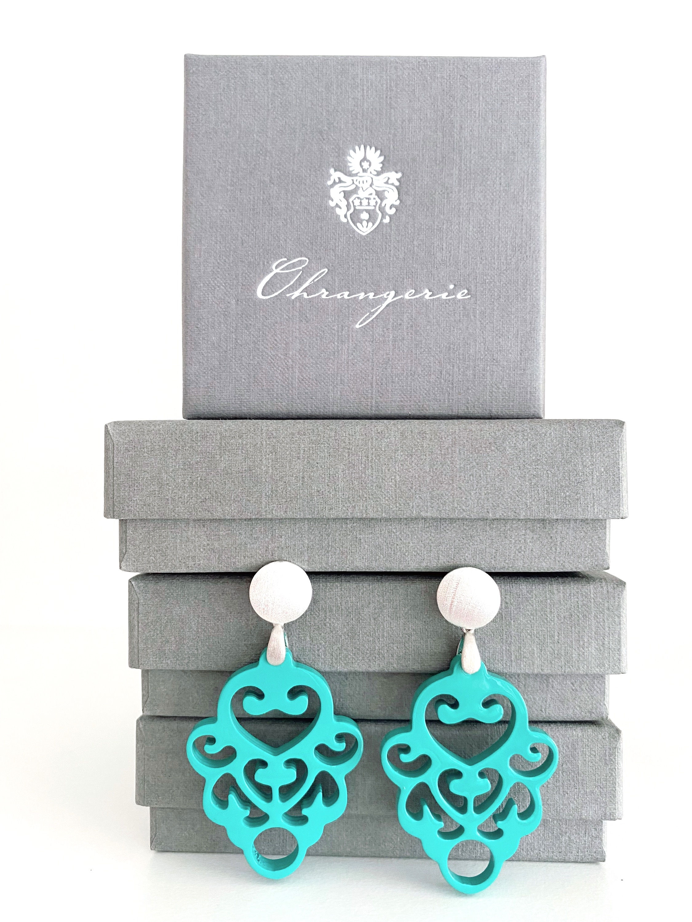 "Alpenveilchen" aus Horn, aquagrün/mint