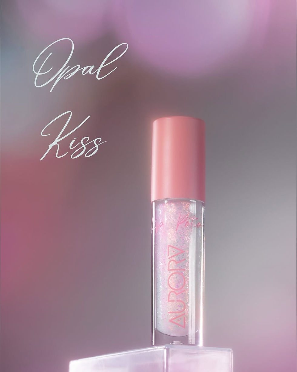vista frontal de lip gloss de aurora pro makeup tono transparente