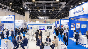 A bustling medical exhibition hall at EgyMedica, with diverse booths showcasing medical equipment and professionals networking.