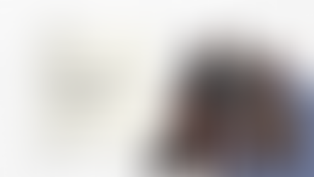 Family with luggage and passports happily explores, child pointing. Text: "Why you need family travel insurance" on textured background.