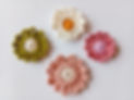 Crochet flower. Crochet of daisy flower. Crocheted flower on white background..jpg