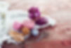 Women's hobby. Crochet and knitting. Working space. Pink balls of yarn, needles, scissors