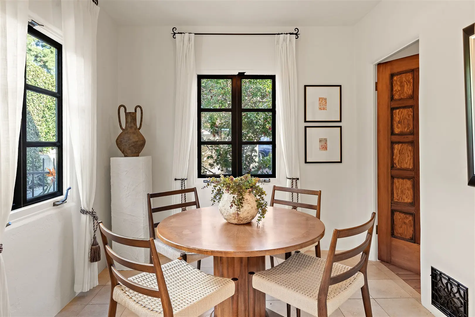 Breakfast room with restored windows at 1239 Geneva Street