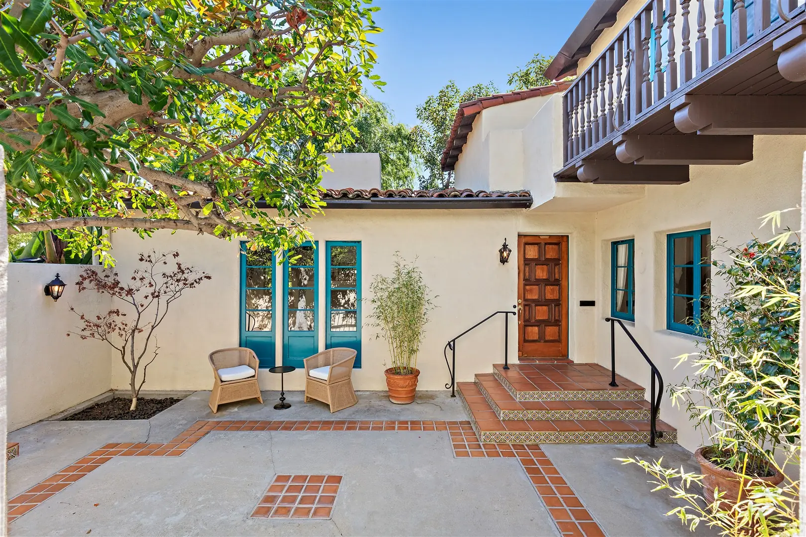 Courtyard entry and restored exterior windows at 1239 Geneva Street