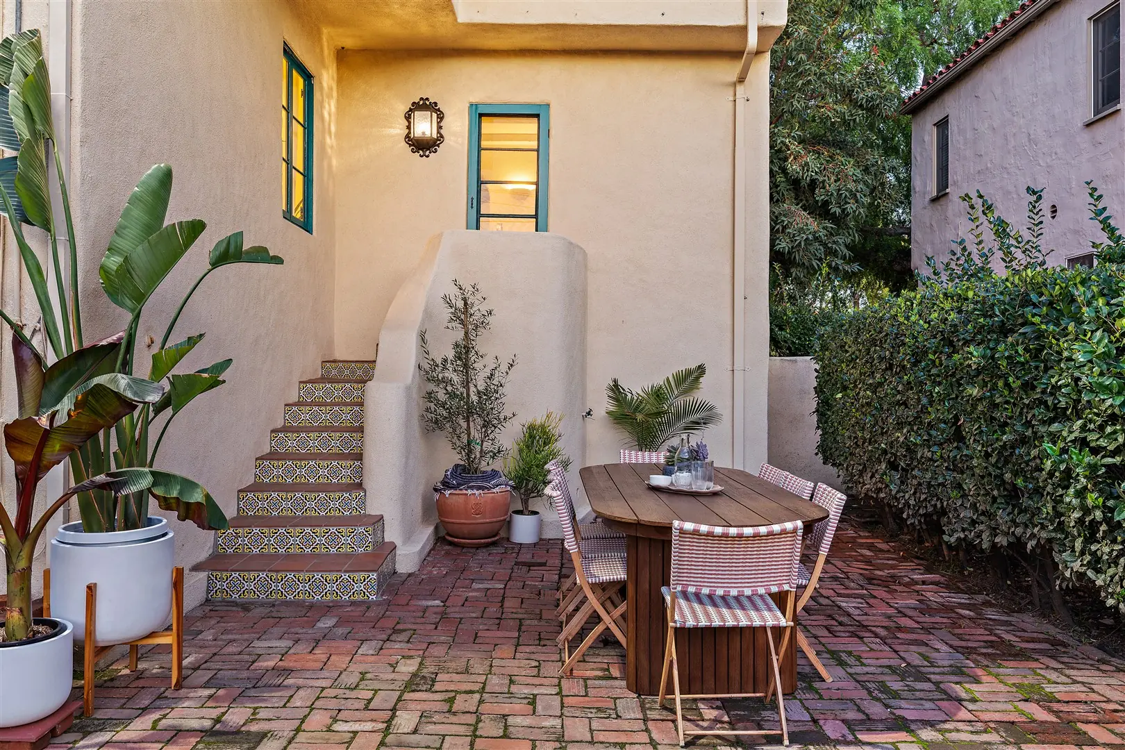 Garden, patio, and mature landscaping at 1239 Geneva Street