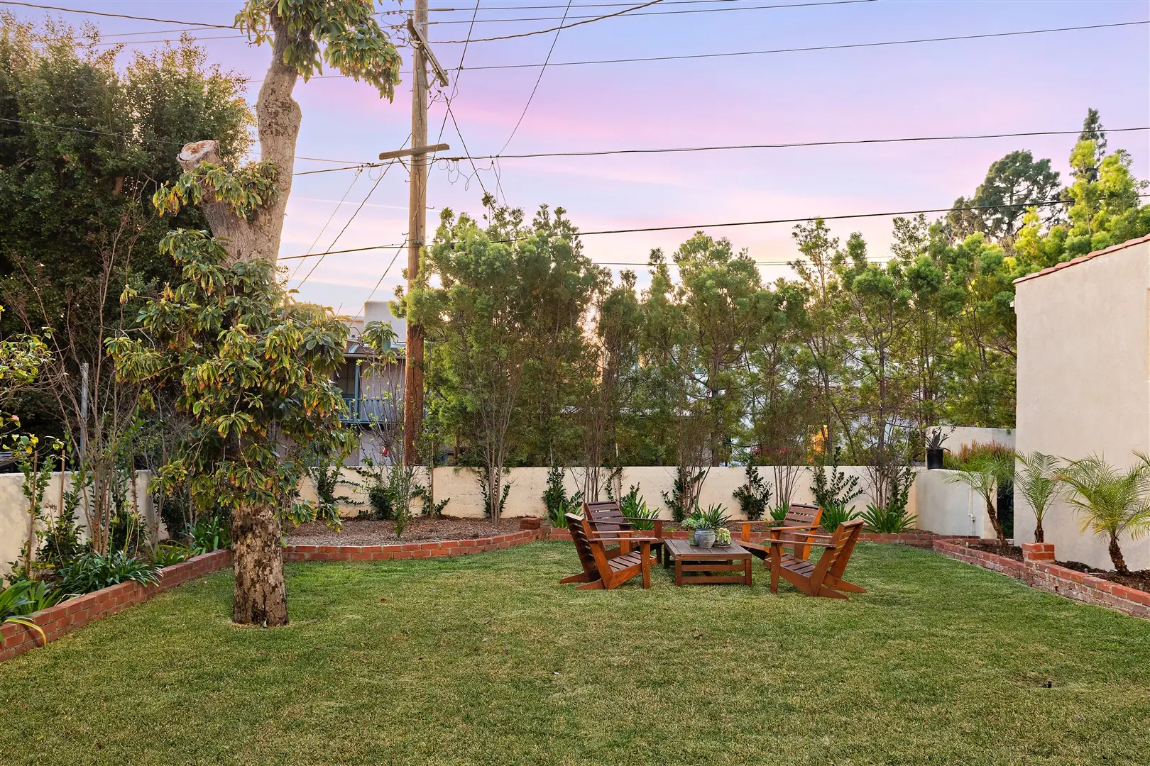 Garden, patio, and mature landscaping at 1239 Geneva Street