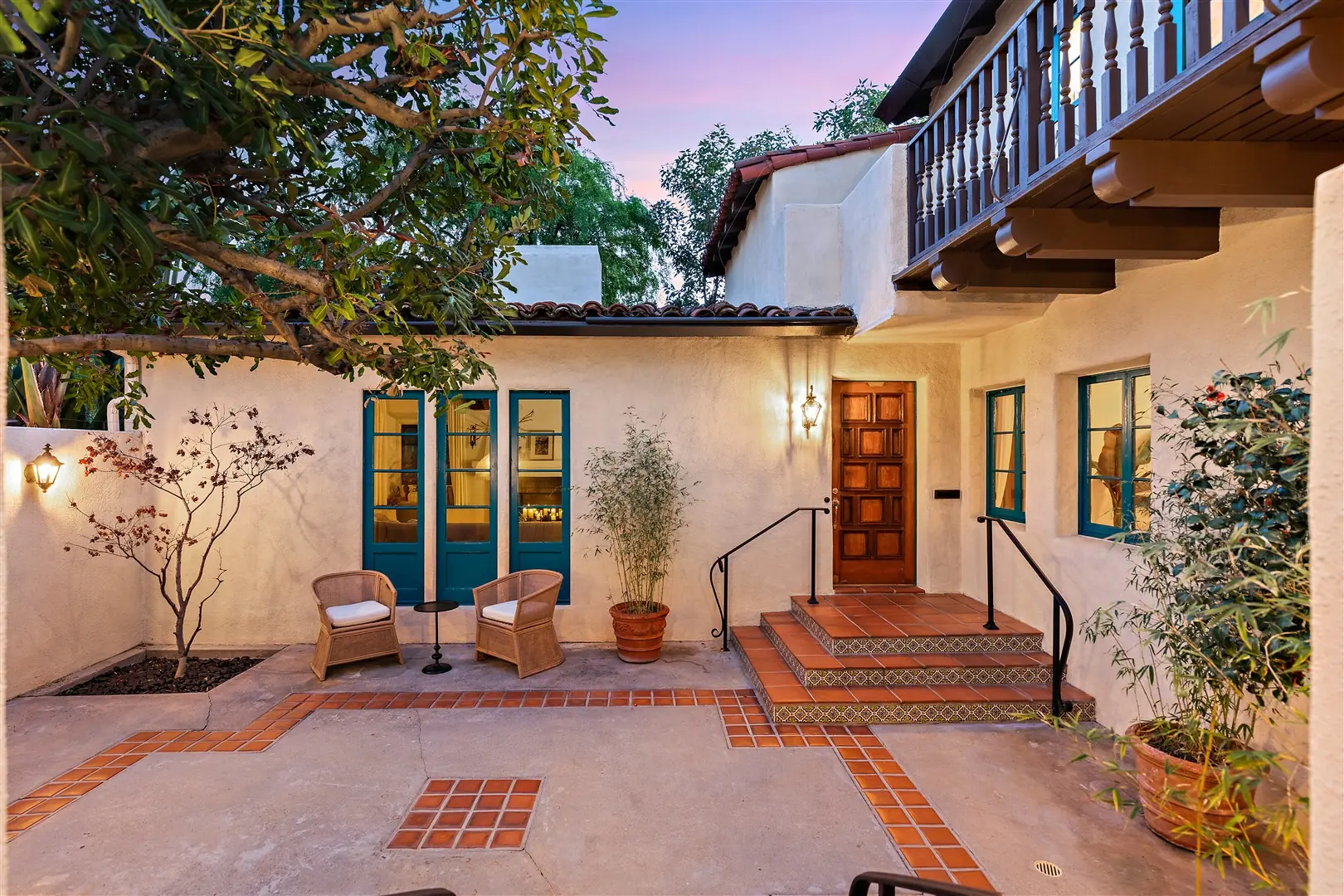 Rear courtyard with balcony and French doors at 1239 Geneva Street