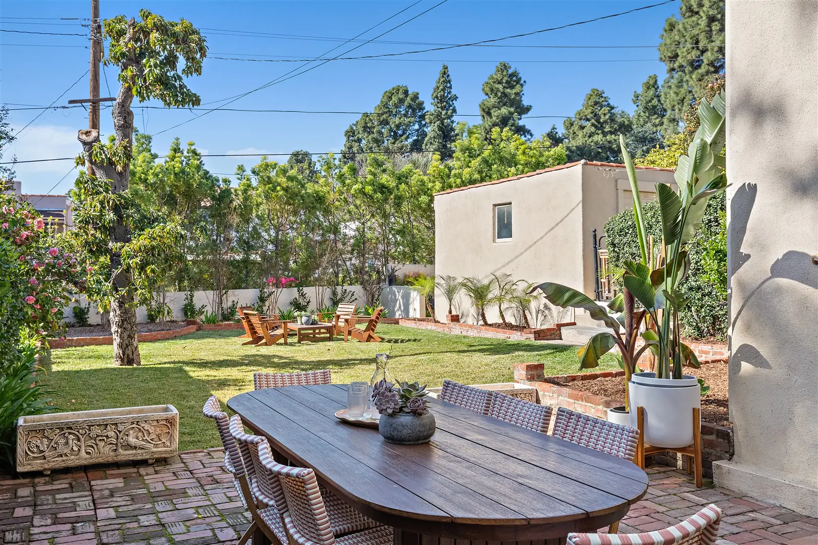 Garden, patio, and mature landscaping at 1239 Geneva Street