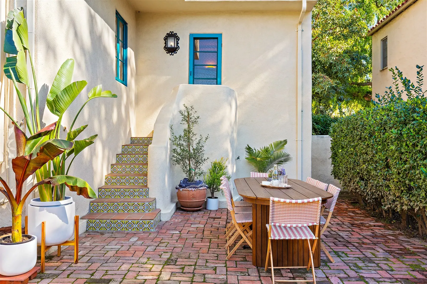 Garden, patio, and mature landscaping at 1239 Geneva Street