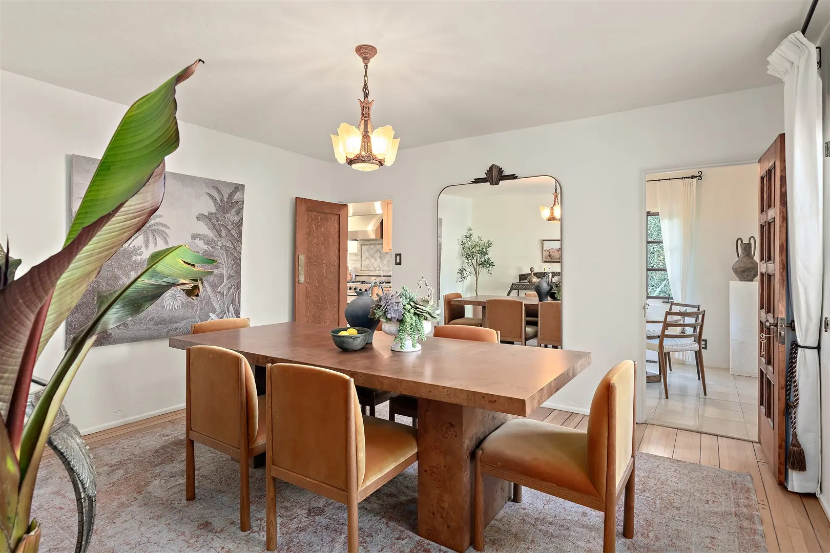 Formal dining room with restored windows and period lighting at 1239 Geneva Street