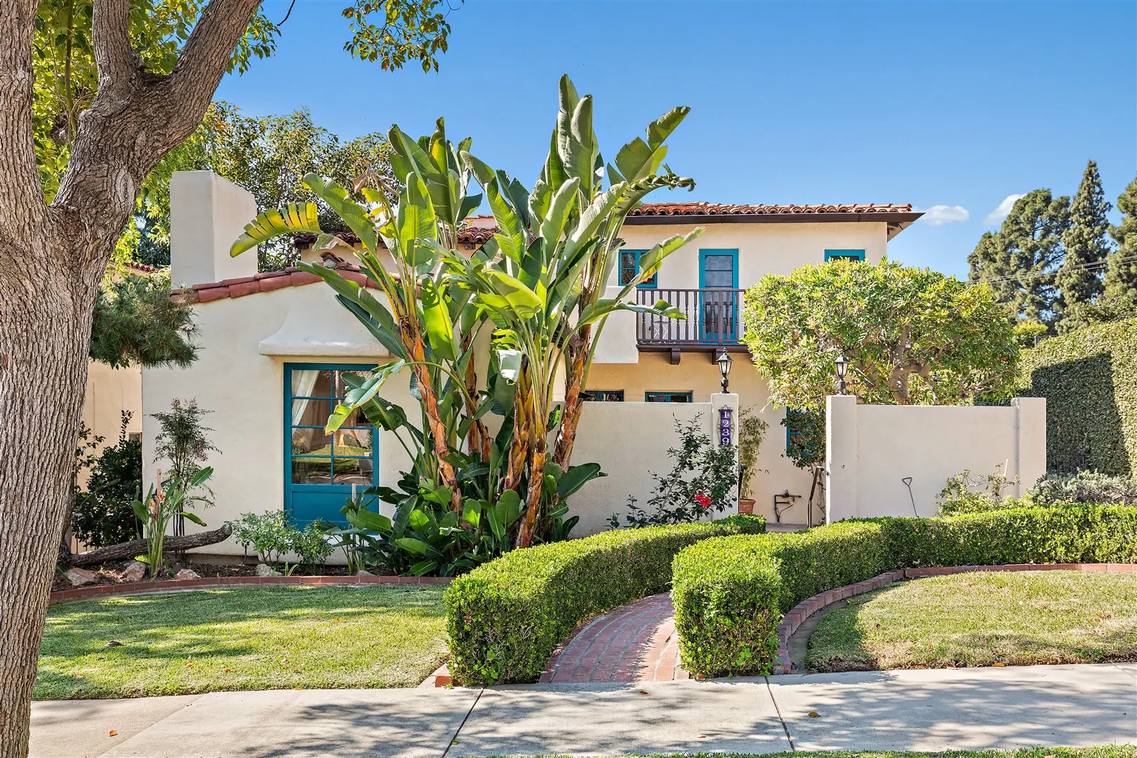Garden, patio, and mature landscaping at 1239 Geneva Street