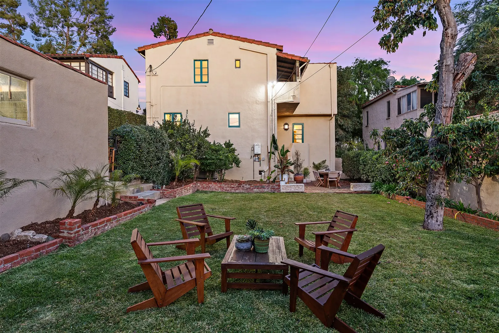 Garden, patio, and mature landscaping at 1239 Geneva Street
