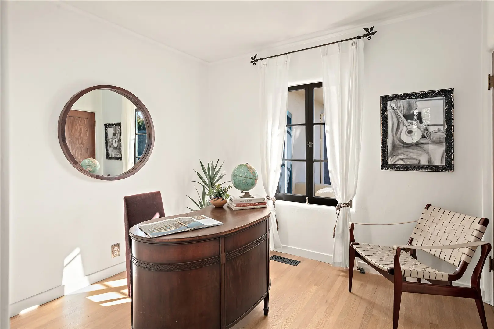 Library and den with built-in shelving at 1239 Geneva Street