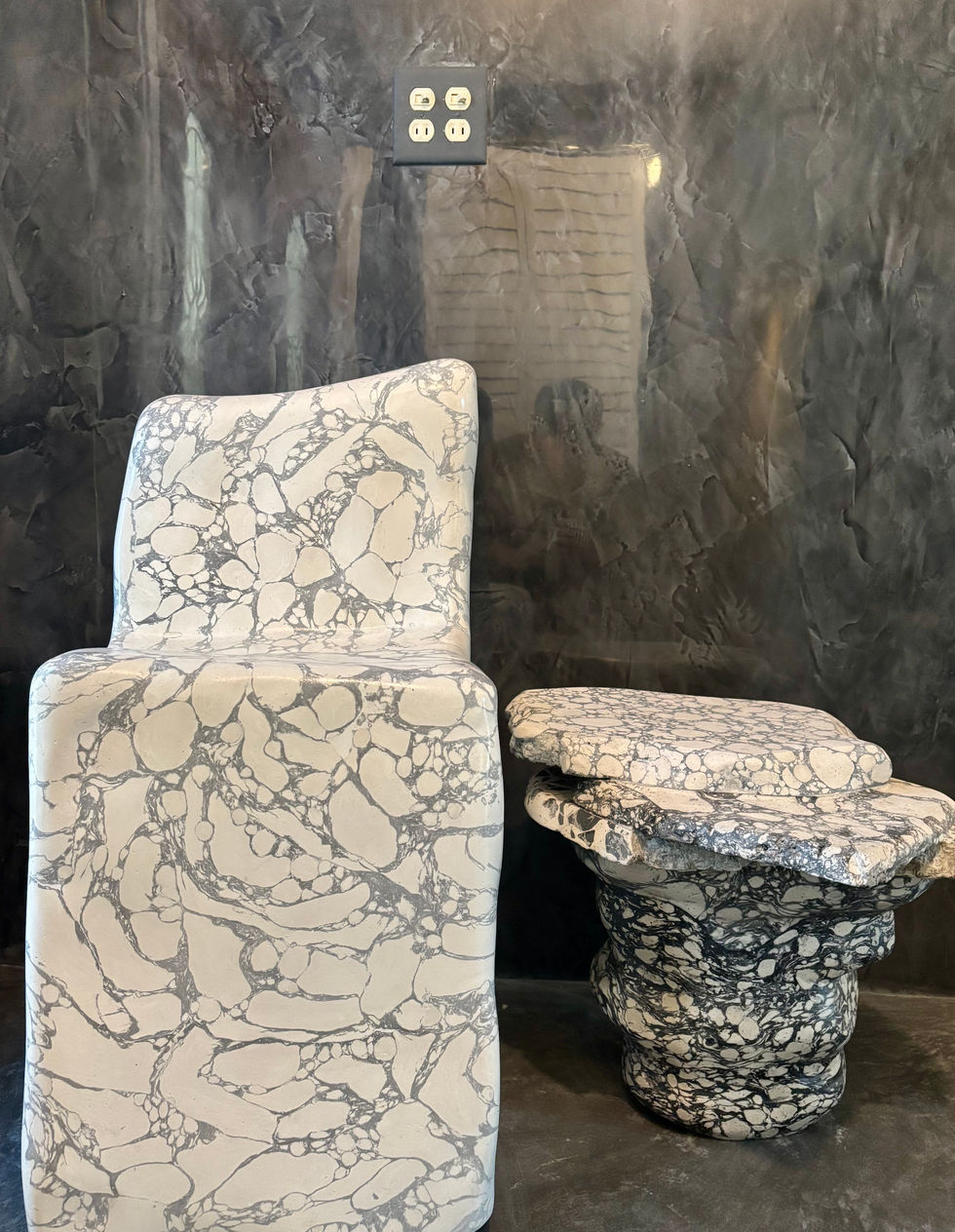 Sustainable sculptural chair crafted with eco-friendly Venetian plaster finish.