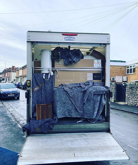 A fully loaded Luton van, ready to be unloaded