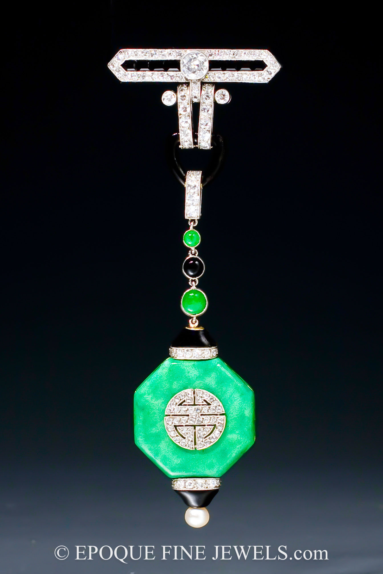 A beautiful Art Deco lapel watch by Van Cleef & Arpels