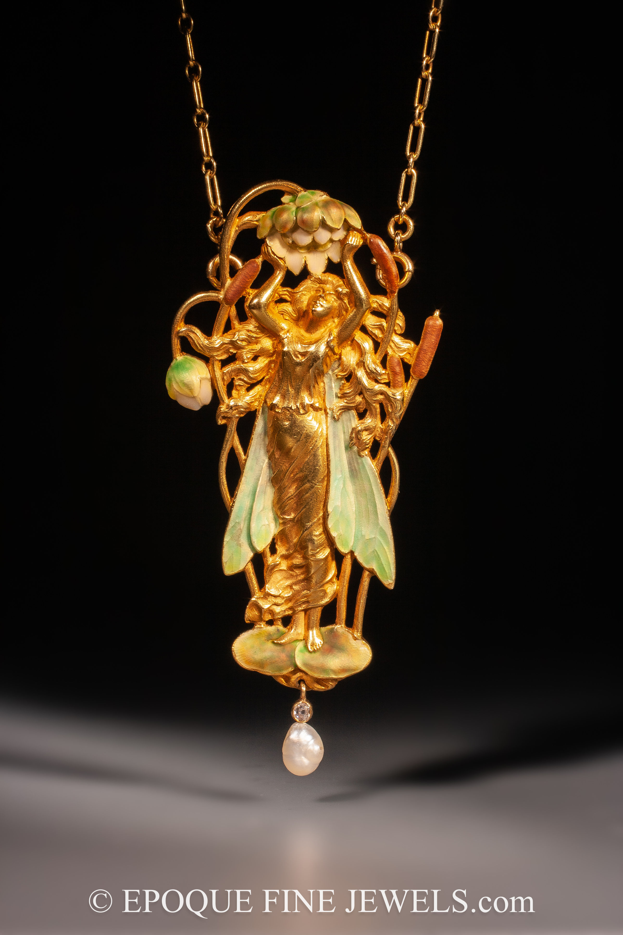 A magnificent Art Nouveau gold and enamel nymph pendant by Gustave-Roger Sandoz