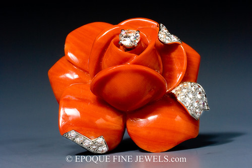 A striking coral and diamond flower brooch by Cartier, Paris