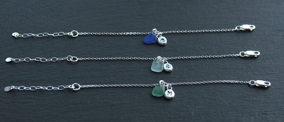 Thumbnail: Silver Pebble and Sea Glass Charm Bracelet