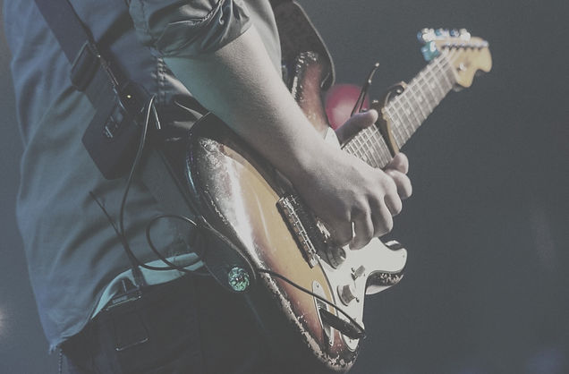 Man Playing Guitar_edited_edited.jpg