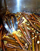 simmering the eldeerberry branches in the leaf lard and pine rosen