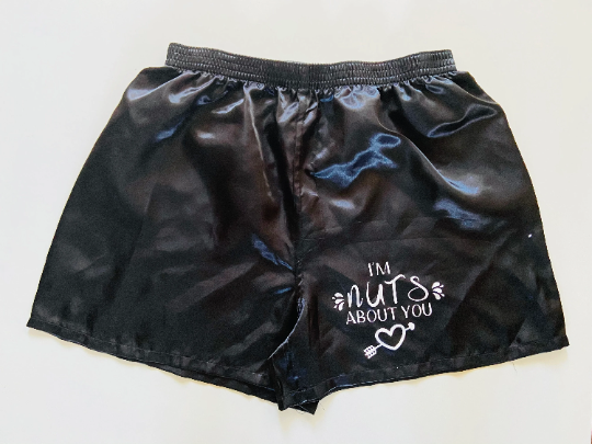 Thumbnail: Black satin shorts with "I'm nuts about you" text and heart.