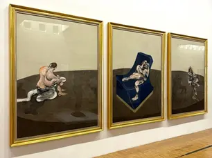 Three Figures in a room by Francis Bacon