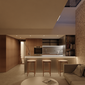 a living room with a couch and a table with a magazine on it. Architect designed extension.
