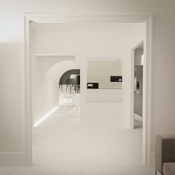 a white room with a sliding glass door leading to a kitchen