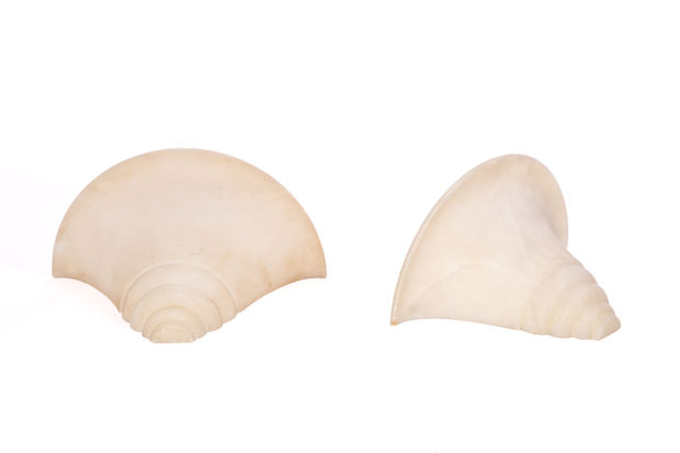 A pair of French art deco sconces made of alabaster. 