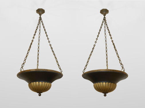 A pair of French metal gold and black suspensions, circa 1920. 