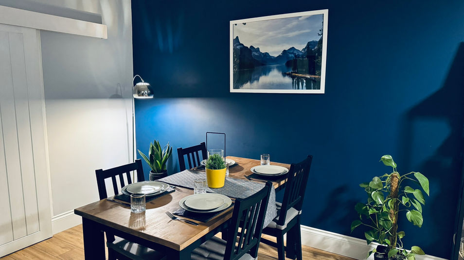 dining table in cosy dining room with plants