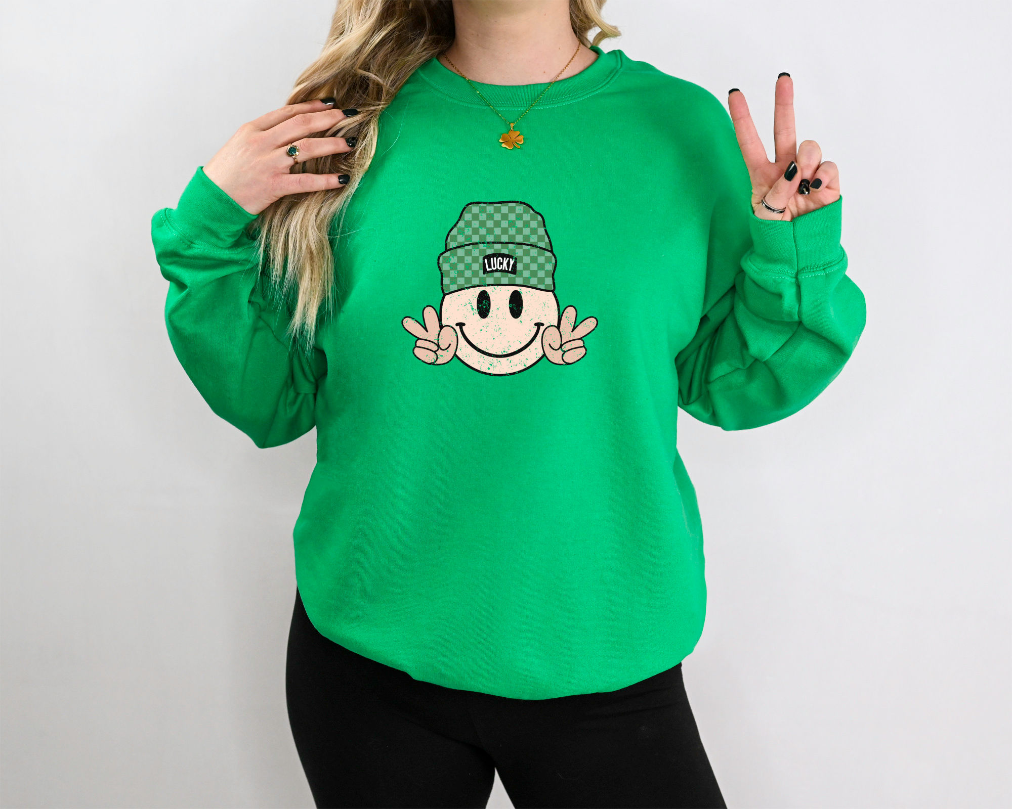 Lucky Smiley Sweatshirt. Shop the Irish Green Lucky Smiley Sweatshirt for a trendy and unique addition to your wardrobe.