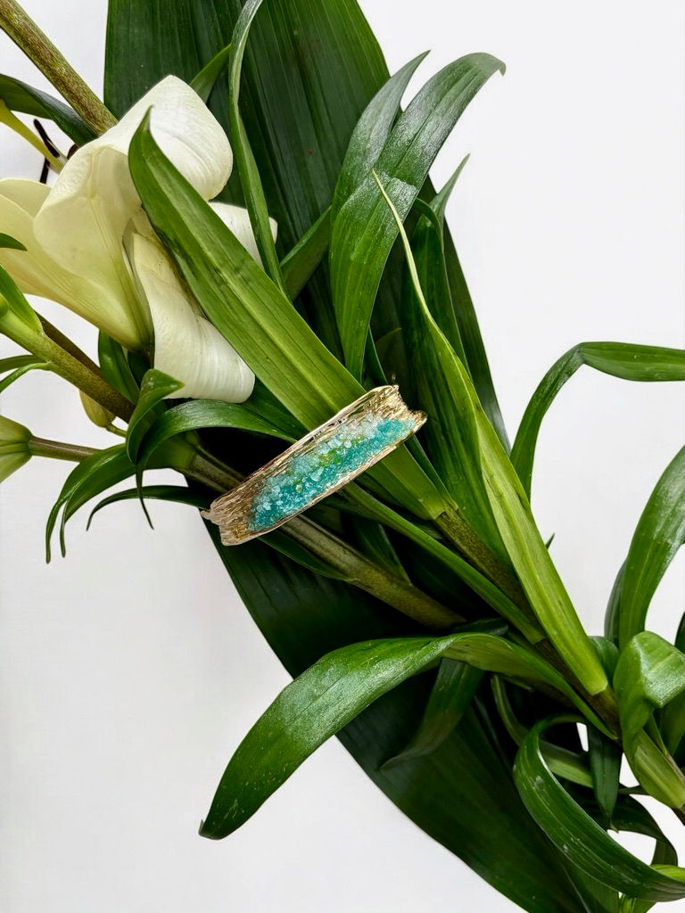gold brass bracelet with aquamarine crystals top view
