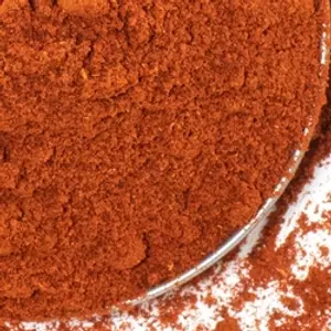 Paprika powder being processed and packed under hygienic conditions