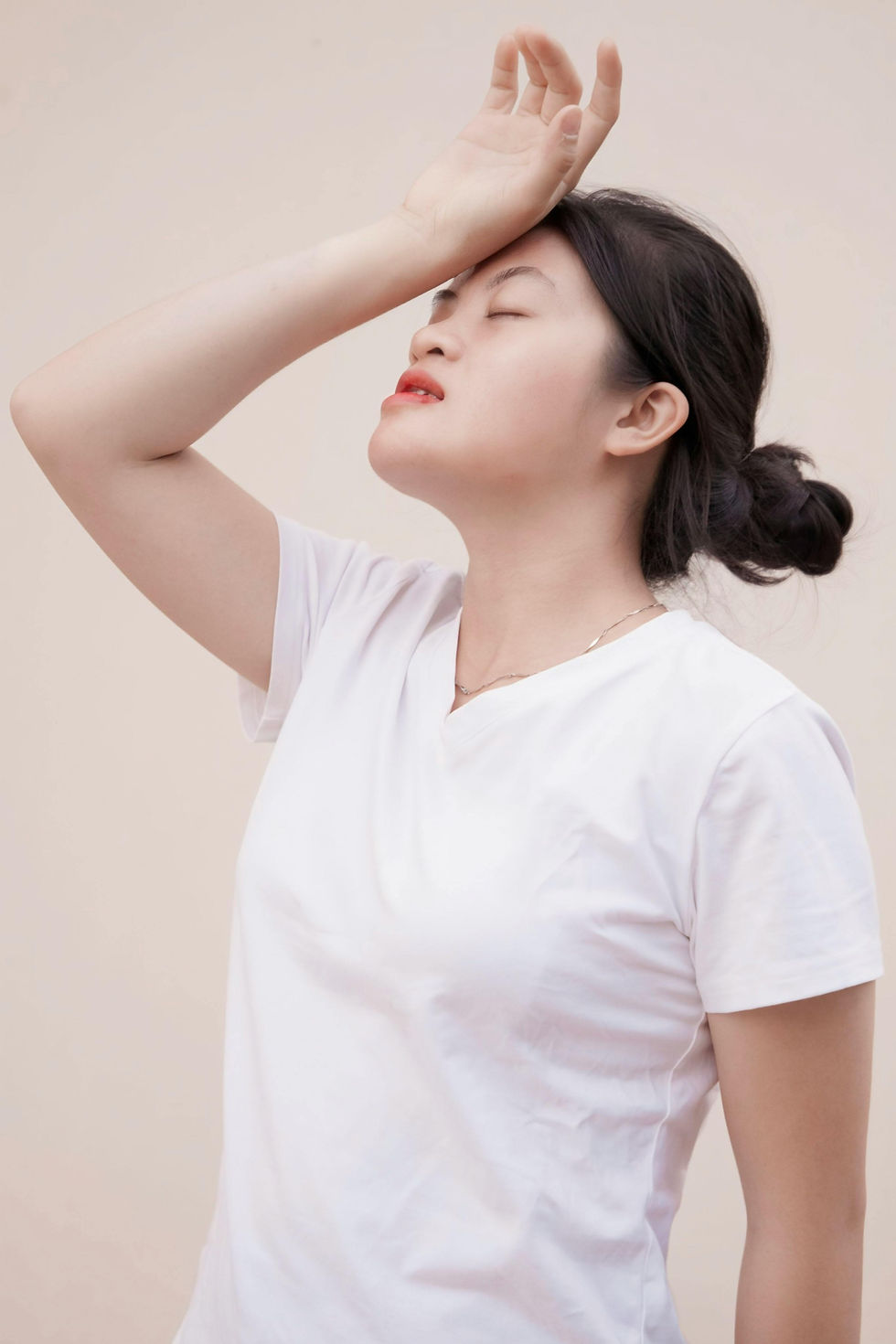 Woman in perimenopause with hot flashes