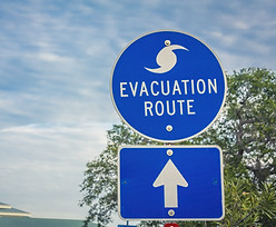 Hurricane Evacuation Route Road Sign on blue with arrow.jpg
