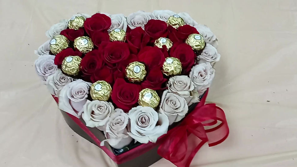 Chocolates and roses in my heart, beautiful flowers design in heart shape container.