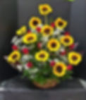 Sunshine love: Sunflowers and roses in basket,